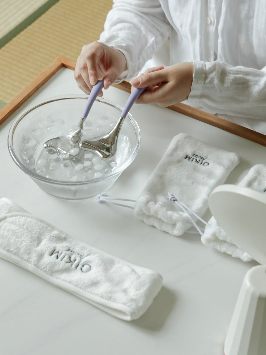 Hot and cold dual-use beauty device — purple silicone handle